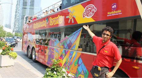 Tourists enjoying the City Sightseeing Toronto bus