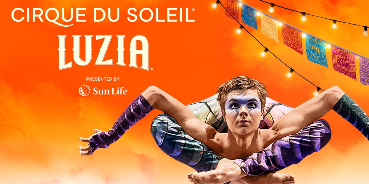 A contortionist performer in costume standing in front of Circus Lighting