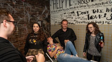 Guests laughing in one of the Escape Rooms at Escape Manor
