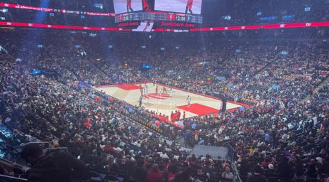 A packed crowd watches the Toronto Raptors compete in a game at Scotiabank Arena